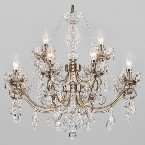 Потолочная люстра Eurosvet Teodore 10103/12 античная бронза/прозрачный хрусталь Strotskis фото Потолочная люстра Eurosvet Teodore 10103/12 античная бронза/прозрачный хрусталь Strotskis. Фото №1
